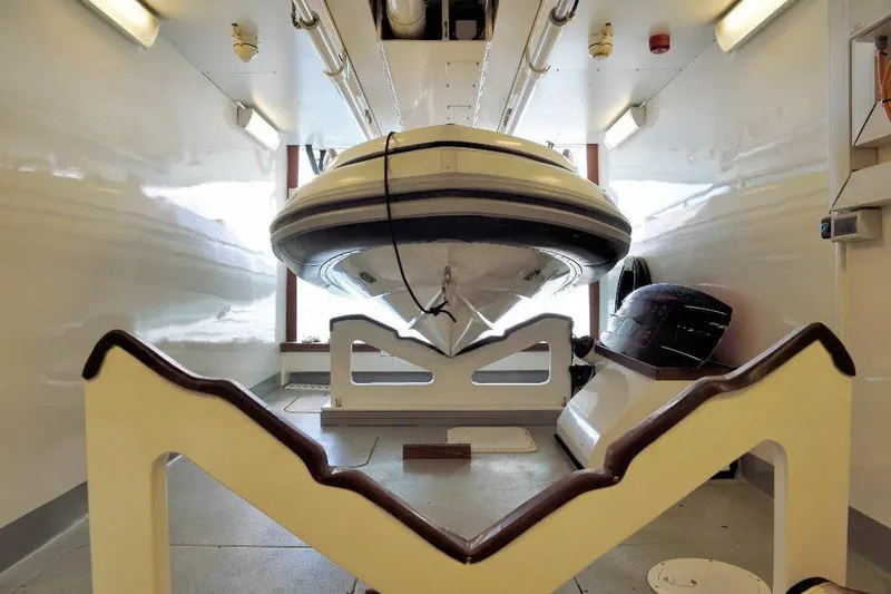  Yacht Photos Pics ISA 120 Sport 2008 yacht interior with stored boat in garage.