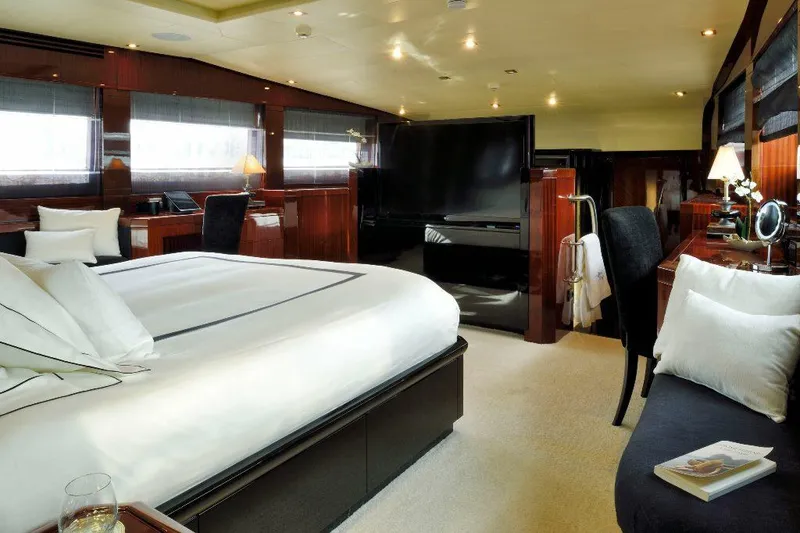  Yacht Photos Pics Luxurious bedroom interior on 2008 ISA 120 Sport yacht, featuring elegant furnishings and modern amenities.