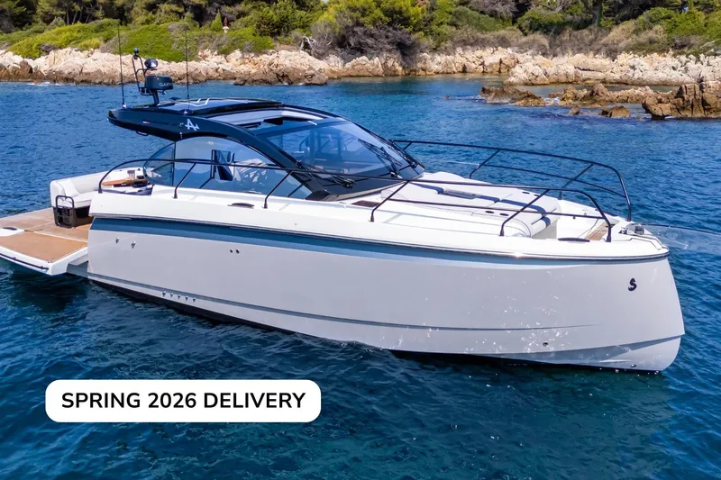 On Order Yacht Photos Pics 2026 Beneteau Gran Turismo 40 yacht on water, spring delivery, scenic coastal backdrop.