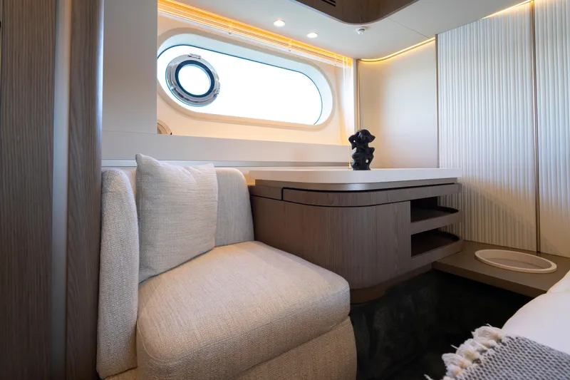 Olivia Yacht Photos Pics Luxurious interior of 2025 Azimut Magellano 60 yacht with elegant seating and modern decor.