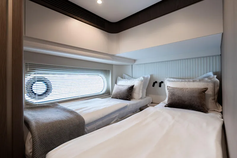 Olivia Yacht Photos Pics Luxurious twin cabin interior on 2025 Azimut Magellano 60 yacht.