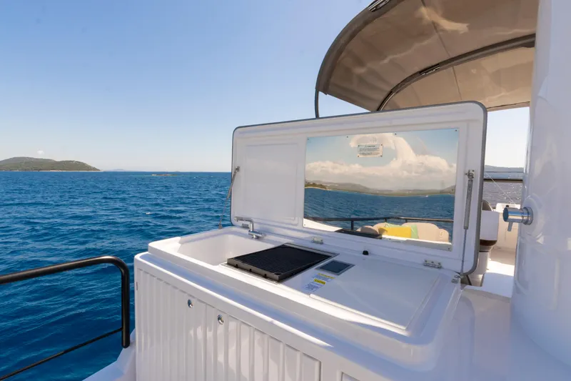 Olivia Yacht Photos Pics Outdoor kitchen on 2025 Azimut Magellano 60 yacht with ocean view.