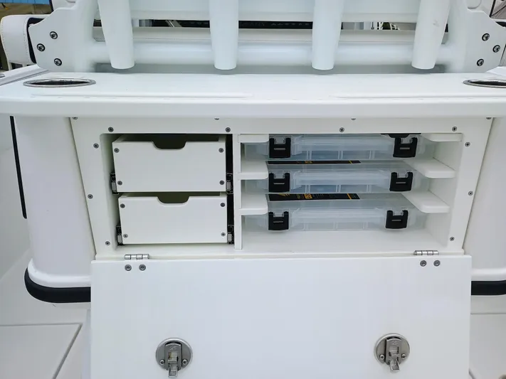  Yacht Photos Pics 2025 Blackfin 252 CC boat storage compartments with tackle boxes and drawers.