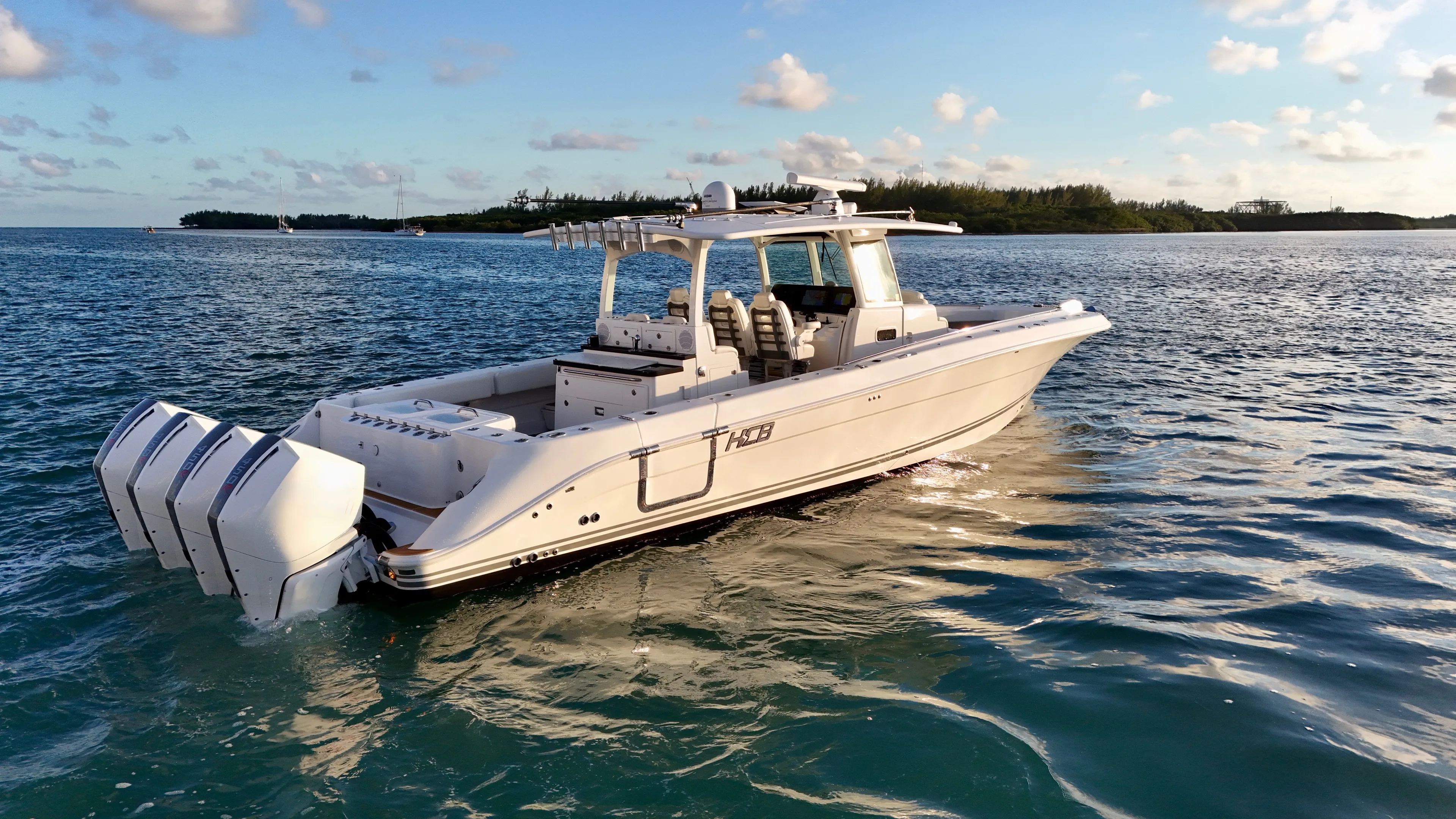  Yacht Photos Pics Luxurious 2021 HCB Lujo boat on calm waters.