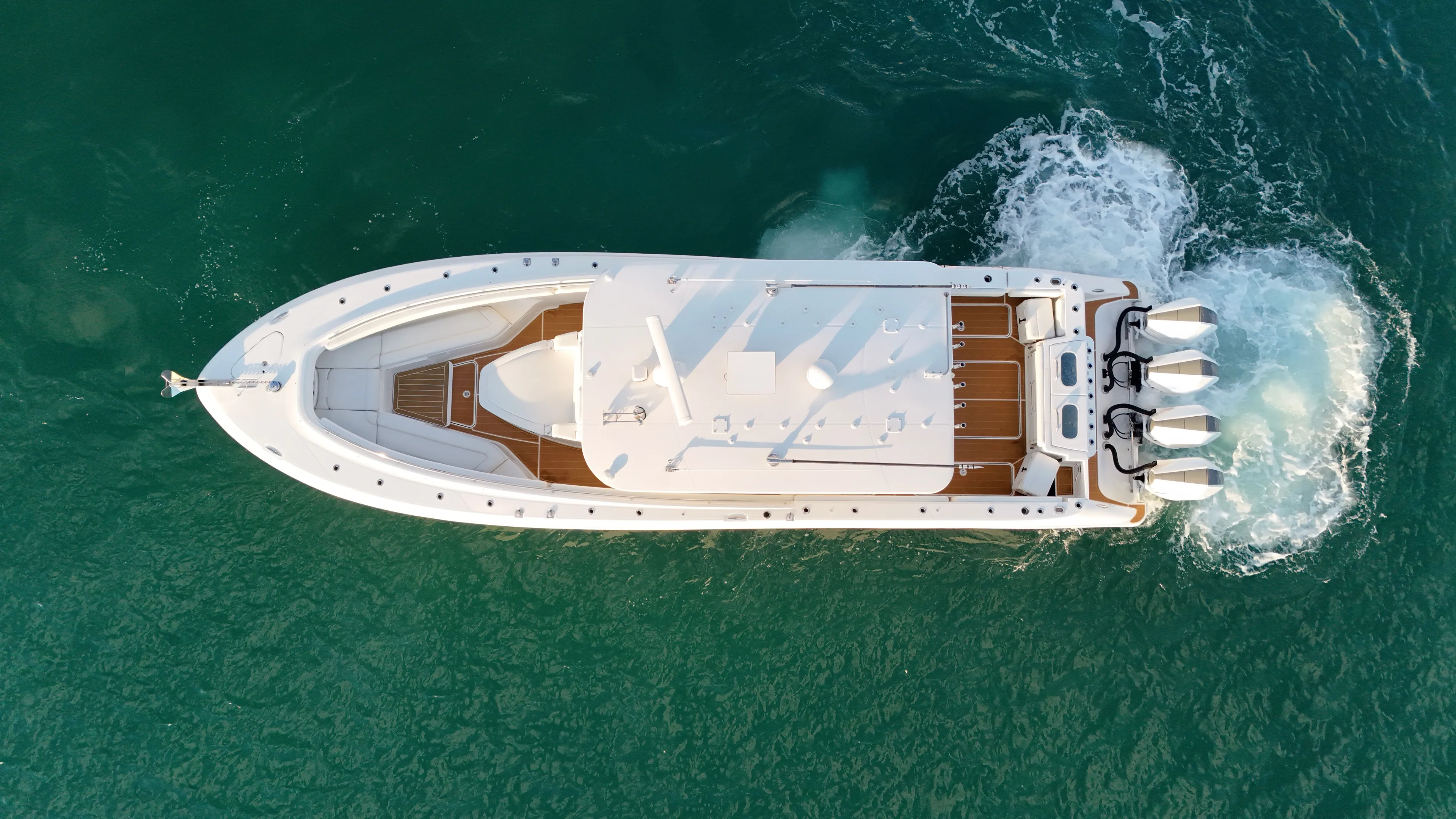  Yacht Photos Pics Aerial view of a 2021 HCB Lujo yacht on the sea.