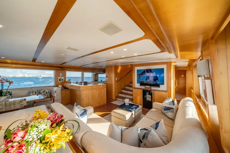 Destination Yacht Photos Pics Luxurious interior of 2007 MCP Tri-Deck yacht with elegant seating and ocean view.