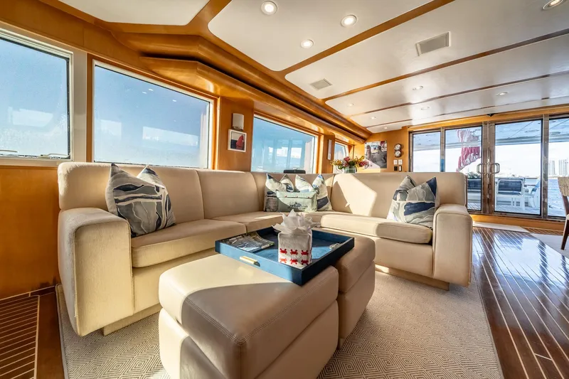 Destination Yacht Photos Pics Luxurious 2007 MCP Tri-Deck yacht interior with elegant seating and panoramic windows.