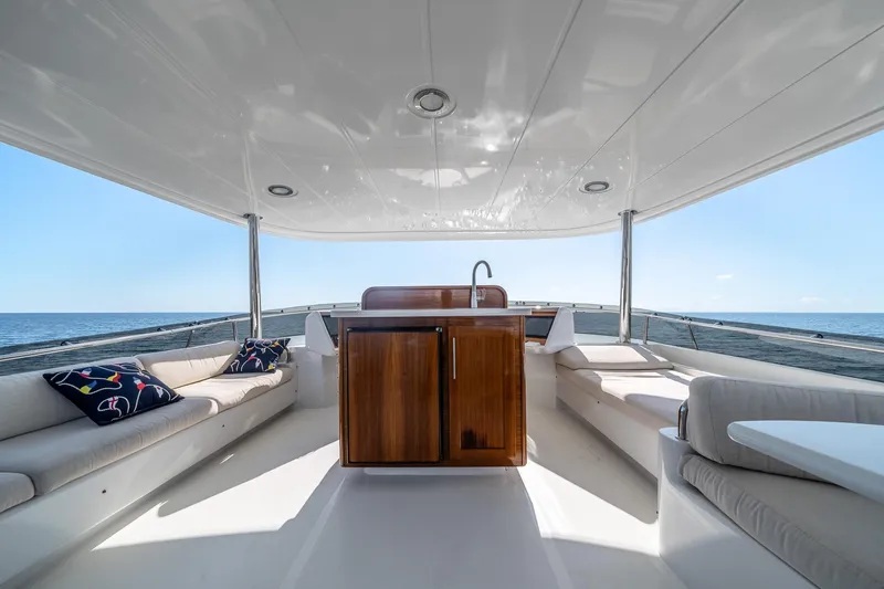 Destination Yacht Photos Pics Luxurious 2007 MCP Tri-Deck yacht interior with elegant seating and ocean view.