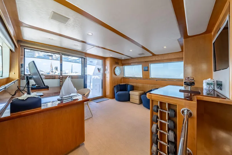 Destination Yacht Photos Pics Luxurious interior of 2007 MCP Tri-Deck yacht with modern furnishings and large windows.