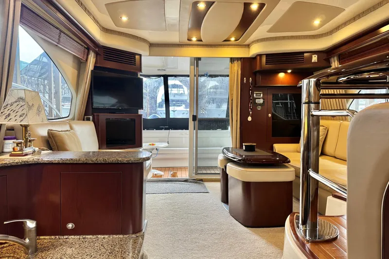 Barefoot Bliss Yacht Photos Pics Luxurious interior of a 2007 Sea Ray 44 Sedan Bridge yacht with elegant furnishings.