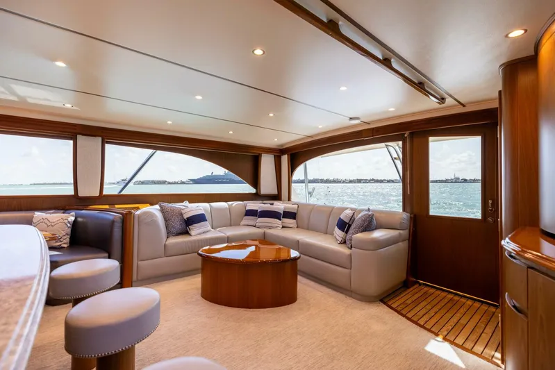 Mighty Mouse Yacht Photos Pics Luxurious interior of 2011 Viking 70 Convertible yacht with plush seating and ocean view.