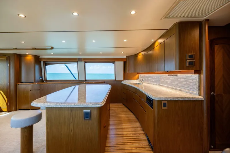 Mighty Mouse Yacht Photos Pics Luxurious interior of 2011 Viking 70 Convertible yacht with modern kitchen design.