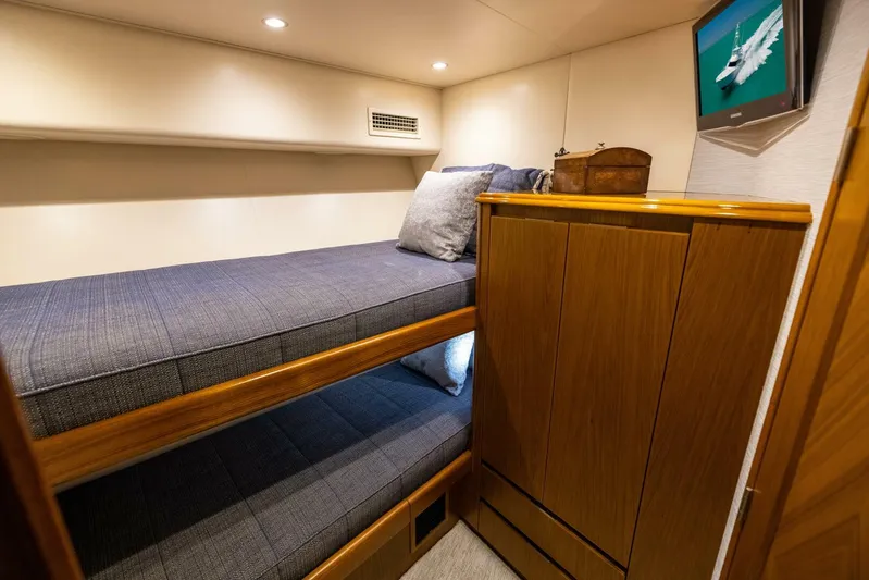Mighty Mouse Yacht Photos Pics Cozy cabin with bunk beds in 2011 Viking 70 Convertible yacht.