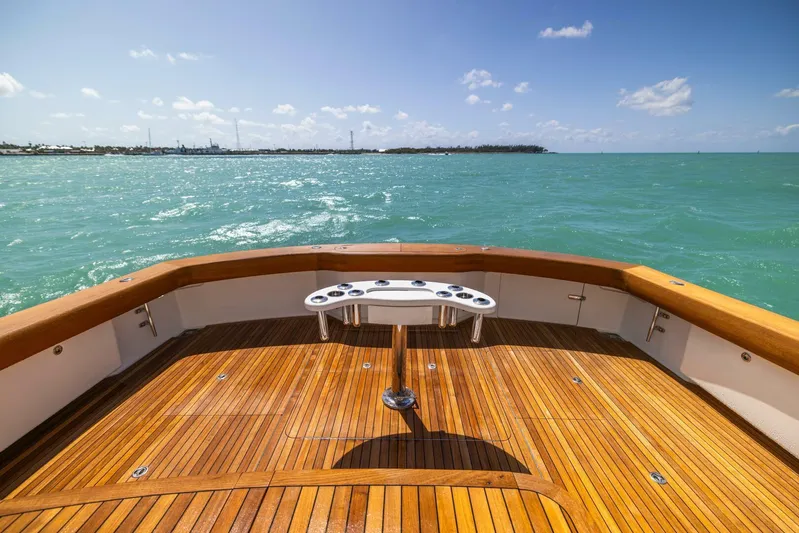 Mighty Mouse Yacht Photos Pics Viking 70 Convertible 2011 yacht deck overlooking ocean under clear blue sky.