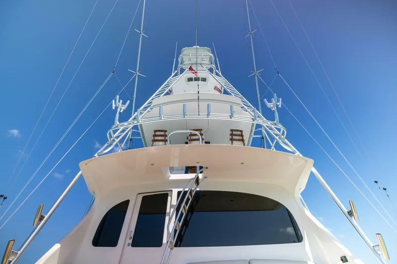 Mighty Mouse Yacht Photos Pics Viking 70 Convertible yacht, 2011 model, viewed from below against a clear blue sky.
