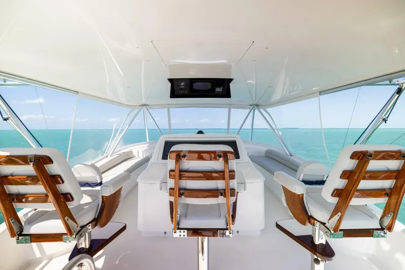 Mighty Mouse Yacht Photos Pics Luxurious 2011 Viking 70 Convertible yacht interior with ocean view and elegant seating.