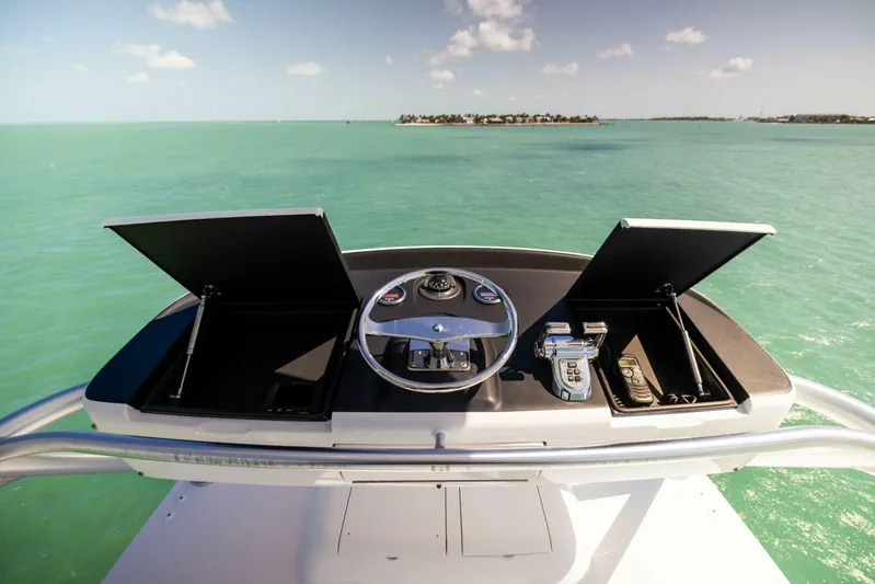 Mighty Mouse Yacht Photos Pics Helm of 2011 Viking 70 Convertible yacht with ocean view.