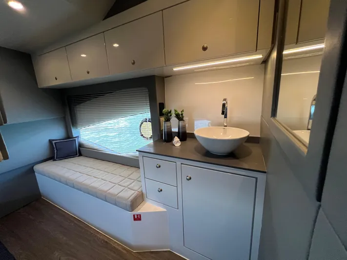  Yacht Photos Pics Modern interior of 2024 Evolve 400HT with sleek cabinetry and stylish sink.