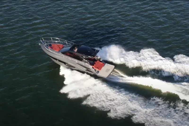  Yacht Photos Pics 2024 Evolve 400HT luxury yacht cruising on open water.