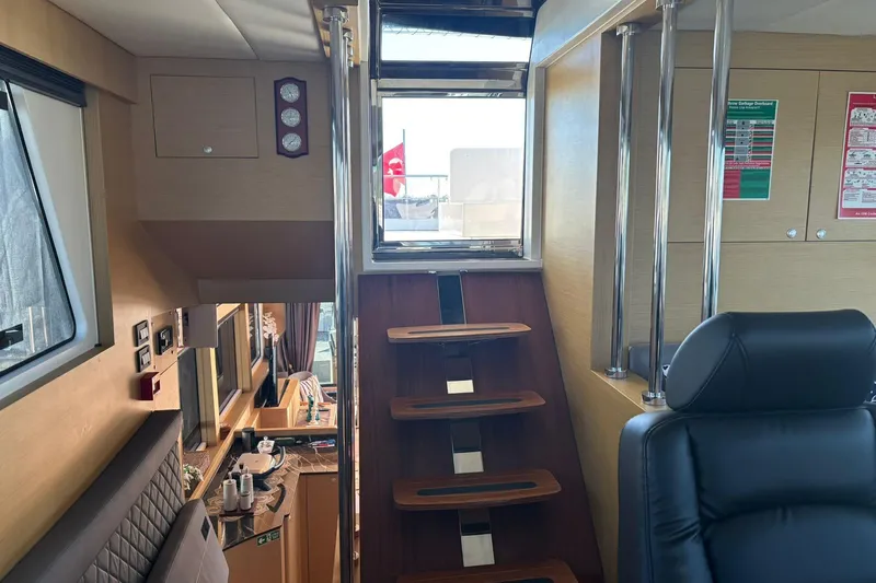  Yacht Photos Pics Interior of 2025 KRC Yachting KRC57, featuring modern staircase and luxurious seating.