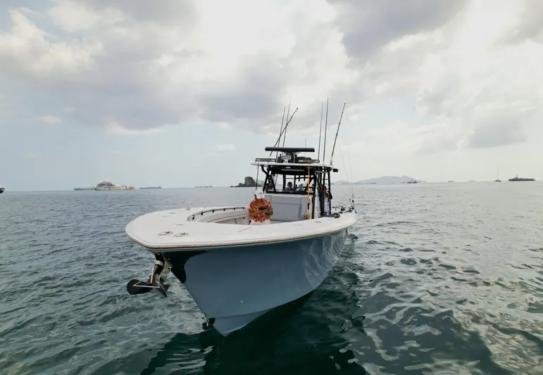  Yacht Photos Pics 2018 SeaHunter 45 Tournament boat on calm ocean waters under cloudy sky.