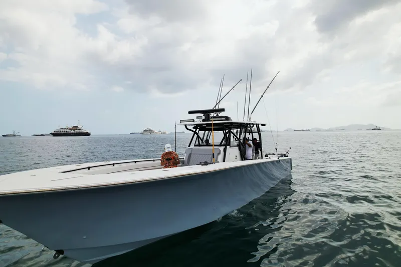  Yacht Photos Pics 2018 SeaHunter 45 Tournament boat on open water, with fishing rods and cloudy sky.