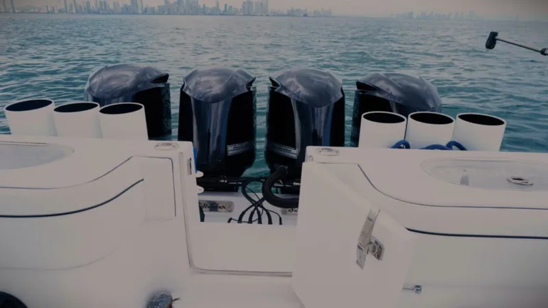  Yacht Photos Pics 2018 SeaHunter 45 Tournament boat with four powerful outboard engines on open water.