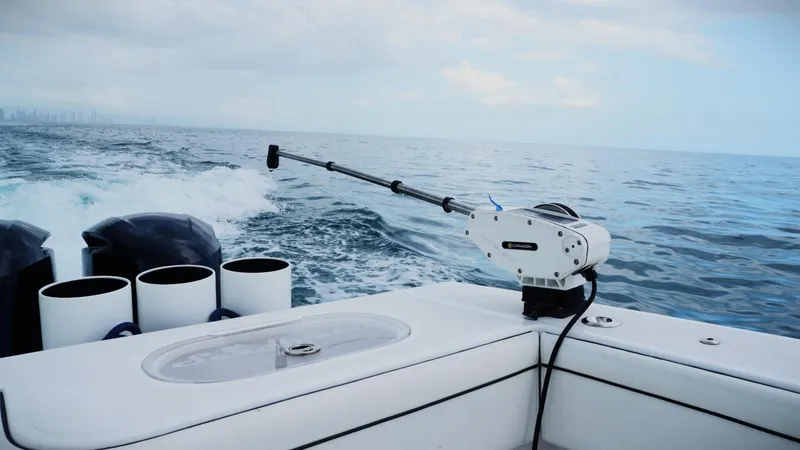  Yacht Photos Pics SeaHunter 45 Tournament boat on open water, featuring fishing equipment, 2018 model.