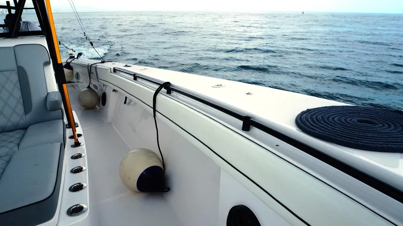  Yacht Photos Pics 2018 SeaHunter 45 Tournament boat deck with ocean view, featuring seating and fishing equipment.