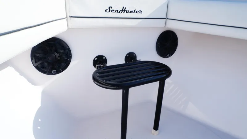  Yacht Photos Pics 2018 SeaHunter 45 Tournament boat interior with speakers and a small table.