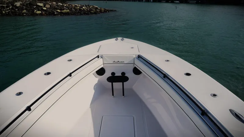  Yacht Photos Pics Bow view of 2018 SeaHunter 45 Tournament boat on calm water.