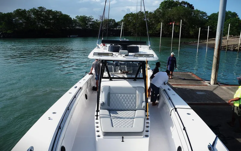  Yacht Photos Pics 2018 SeaHunter 45 Tournament boat docked, featuring spacious seating and sleek design.