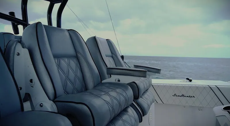  Yacht Photos Pics 2018 SeaHunter 45 Tournament boat interior with luxurious seating, ocean view in background.