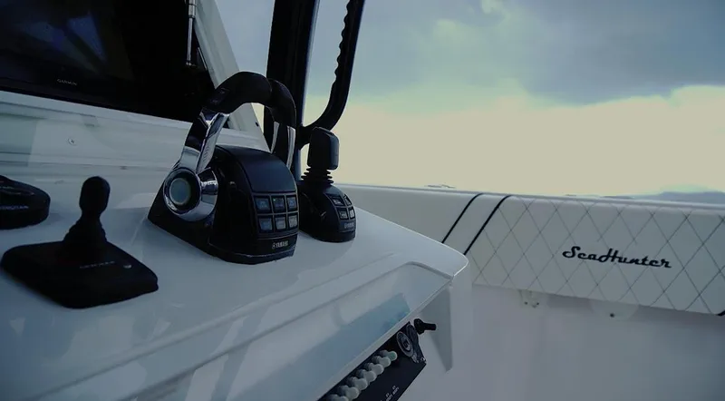  Yacht Photos Pics Control panel of 2018 SeaHunter 45 Tournament boat with throttle levers.