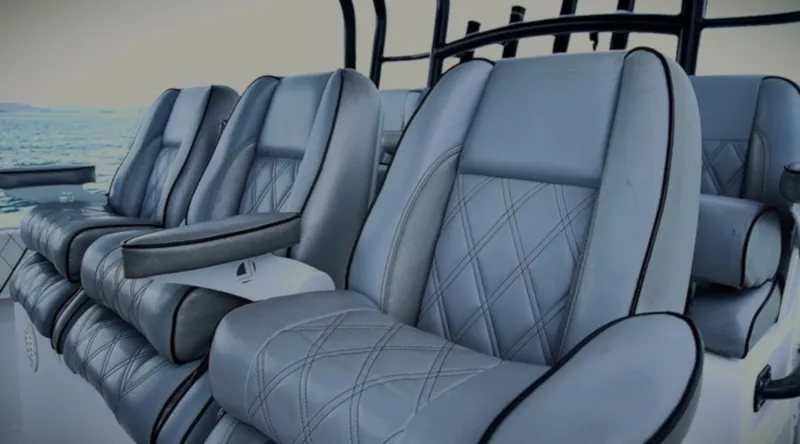 Yacht Photos Pics Luxurious seating on 2018 SeaHunter 45 Tournament boat with diamond-stitched upholstery.