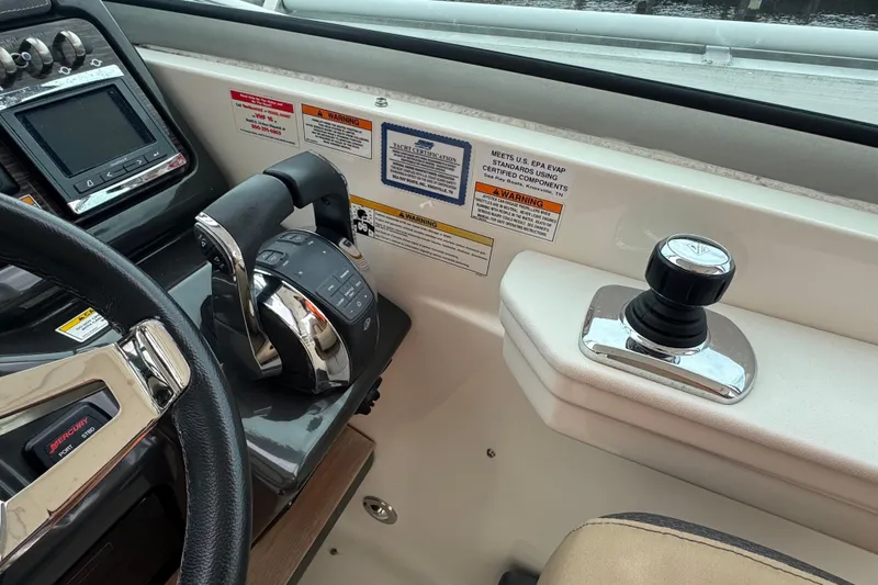 Yacht Photos Pics 2016 Sea Ray 350 Sundancer helm with controls and navigation system.