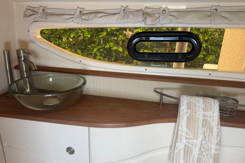  Yacht Photos Pics Interior of 2016 Sea Ray 350 Sundancer with glass sink and window view.