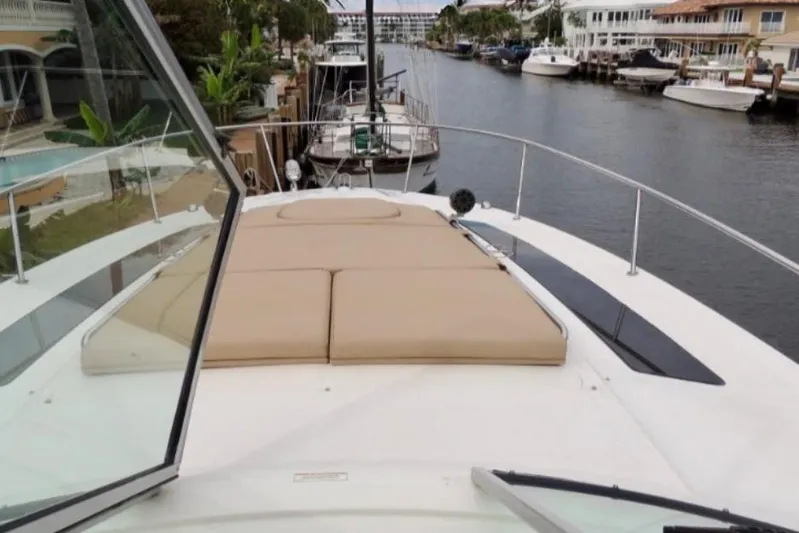  Yacht Photos Pics 2016 Sea Ray 350 Sundancer yacht with sunpad, docked in a scenic canal.