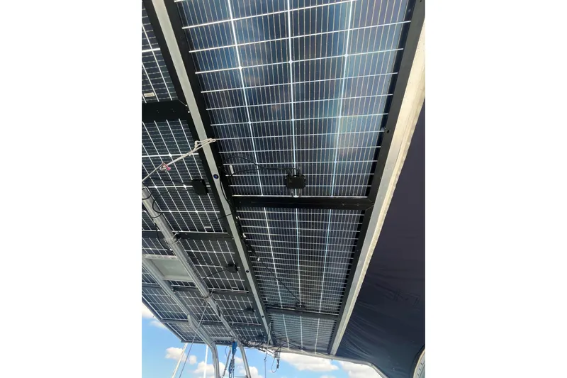 Sea Glass Yacht Photos Pics Solar panels on a 2000 Fountaine Pajot Belize 43 catamaran, viewed from below.