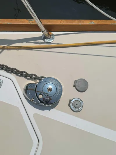 Side Aye Yacht Photos Pics Anchor windlass on 2009 Tartan 3400 sailboat deck with chain and fittings.