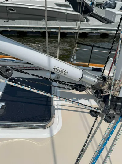 Side Aye Yacht Photos Pics Sailboat rigging on a 2009 Tartan 3400, docked at a marina.