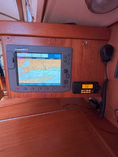 Side Aye Yacht Photos Pics Navigation equipment on 2009 Tartan 3400 sailboat, featuring GPS and communication devices.