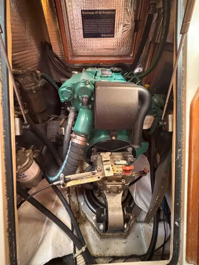 Side Aye Yacht Photos Pics Engine compartment of a 2009 Tartan 3400 sailboat, featuring a well-maintained marine engine.