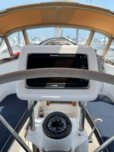 Side Aye Yacht Photos Pics Cockpit view of 2009 Tartan 3400 sailboat with navigation equipment.