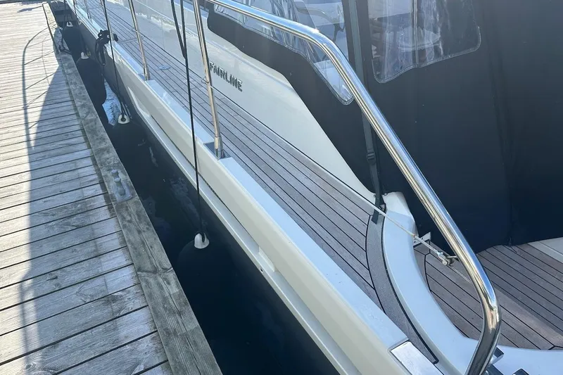 Three Bears Yacht Photos Pics 2012 Fairline Targa 58 yacht docked, showcasing sleek design and polished railings.