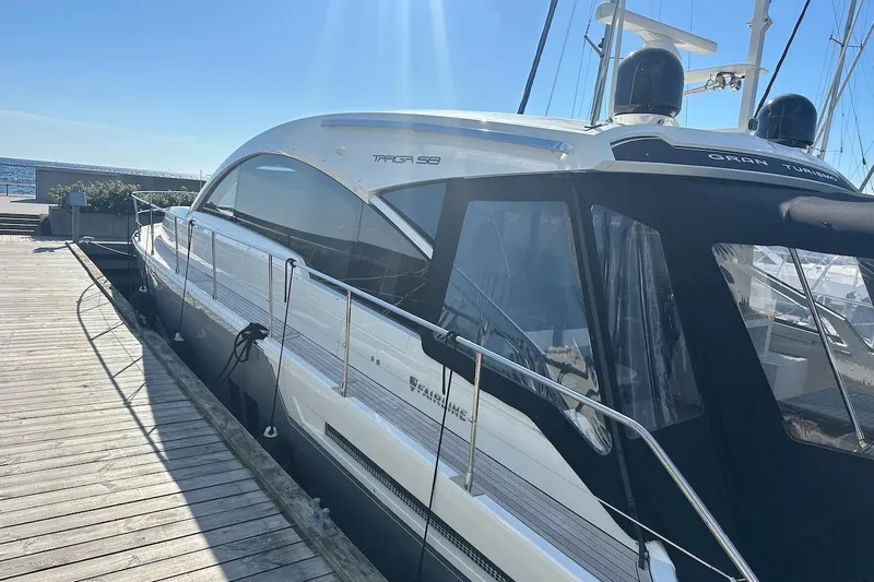 Three Bears Yacht Photos Pics 2012 Fairline Targa 58 yacht docked under clear blue sky.