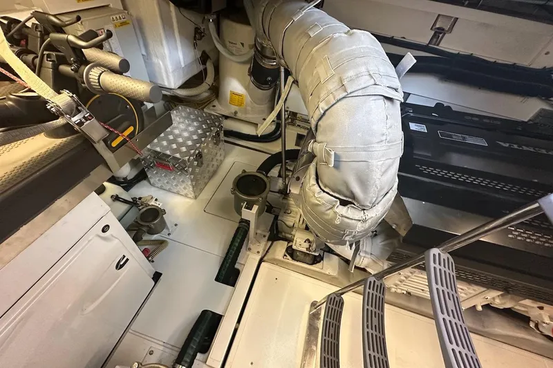 Three Bears Yacht Photos Pics Engine room of 2012 Fairline Targa 58 yacht, featuring mechanical components and equipment.