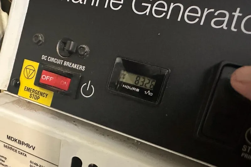 Three Bears Yacht Photos Pics Control panel of a Fairline Targa 58 yacht generator, showing 832.8 hours.