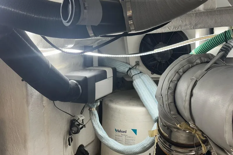 Three Bears Yacht Photos Pics Engine room of 2012 Fairline Targa 58 yacht with ventilation and exhaust systems.