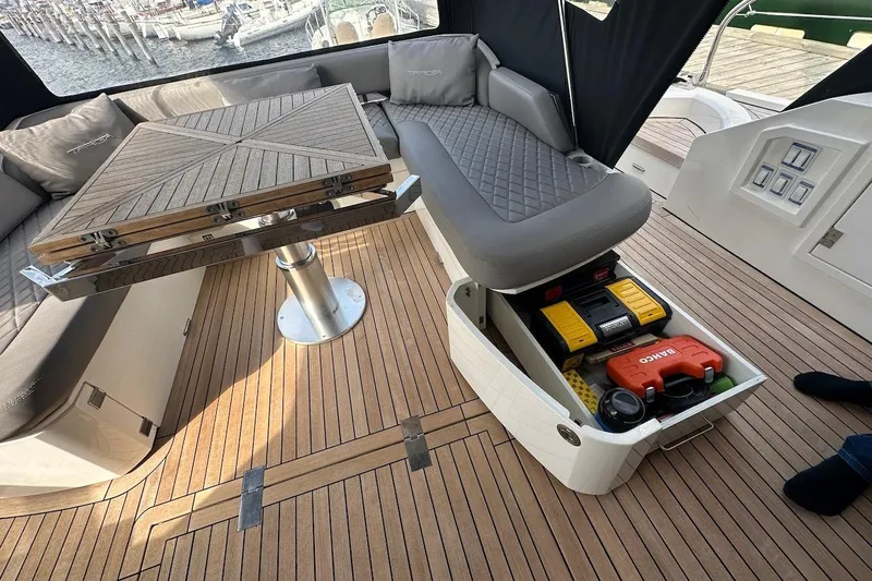 Three Bears Yacht Photos Pics Luxurious 2012 Fairline Targa 58 yacht interior with storage and seating.